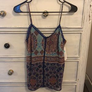 Printed cami with embroidery detail!